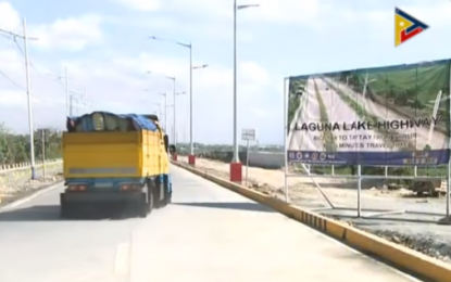 <p><strong>LAGUNA LAKE HIGHWAY NOW OPEN. </strong>A truck traverses through the newly-opened Laguna Lake Expressway. <em>(Screengrab from PTV)</em></p>